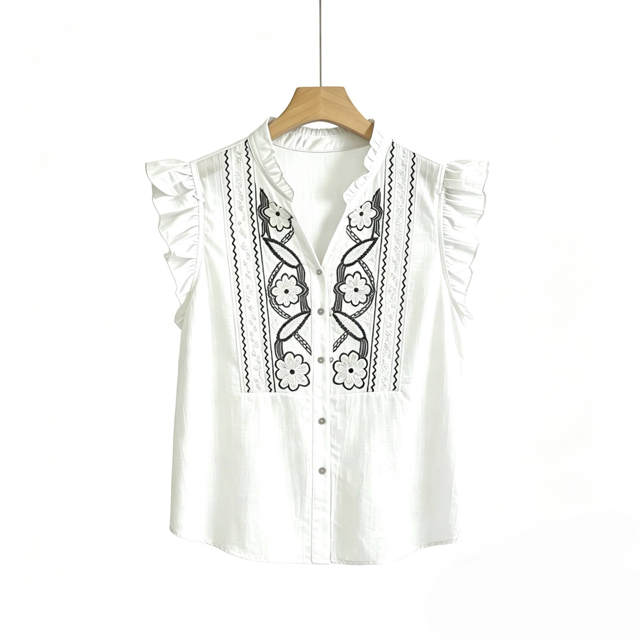 Top fluide broderie graphique blanc bleu